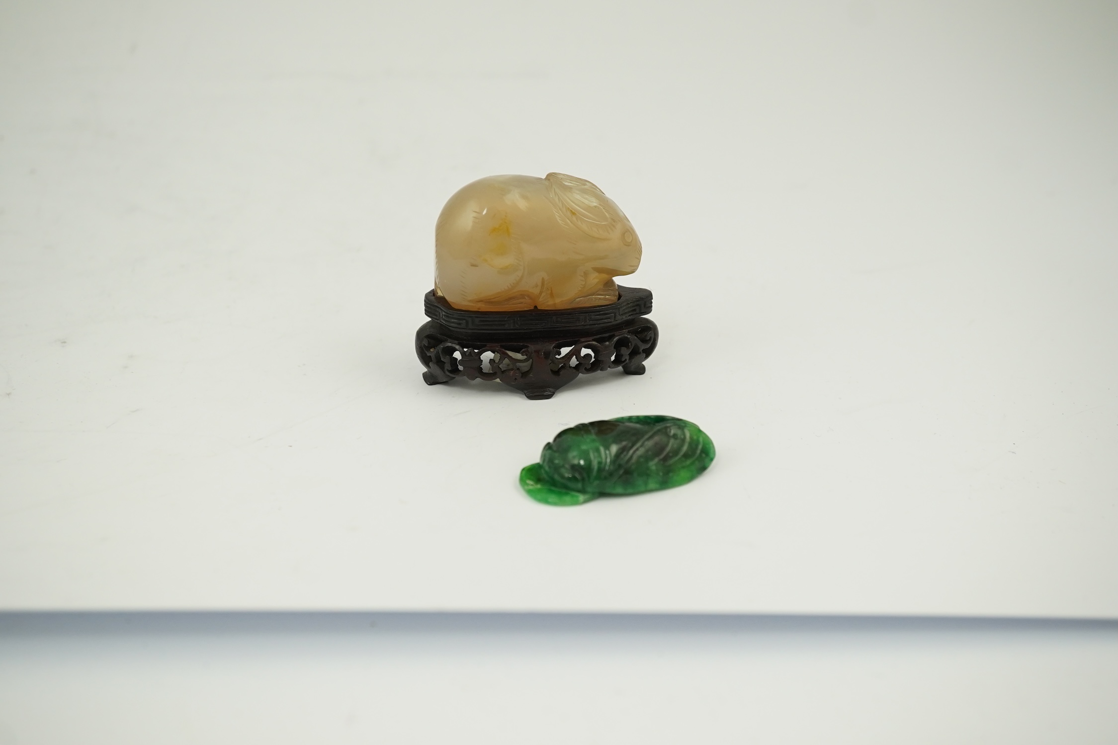 Chinese agate rabbit snuff bottle on stand and green hardstone bug pendant, rabbit snuff bottle 5cm long. Condition - good